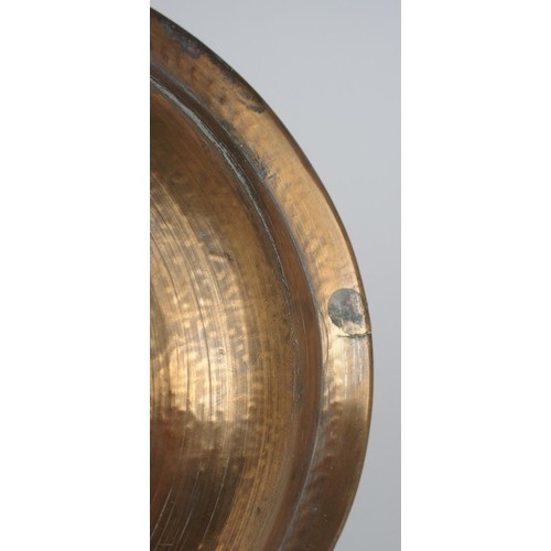 2382 - A PERSIAN BRASS AND SILVER BOWL decorated with script and foliage divided by diaper and trellis patt... 