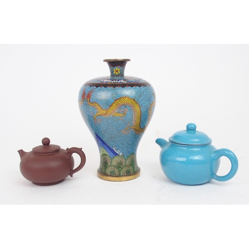 2394 - A CHINESE ROBINS EGG BLUE CRACKLE GLAZE TEAPOT AND COVER signed, 13cm wide, Yixing teapot and cover,... 