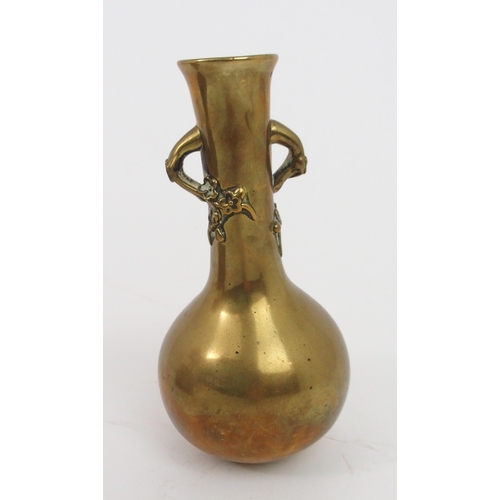 2404 - A CHINESE BRASS BALUSTER VASE cast with flowering twin branches, and a plated brass hand warmer... 