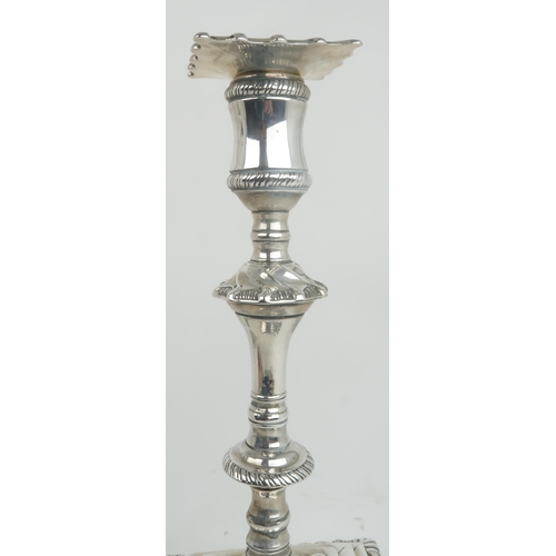2472 - A MATCHED PAIR OF GEORGE III SILVER CANDLESTICKSone with maker's mark IC, London 1770, another maker... 