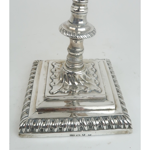 2472 - A MATCHED PAIR OF GEORGE III SILVER CANDLESTICKSone with maker's mark IC, London 1770, another maker... 