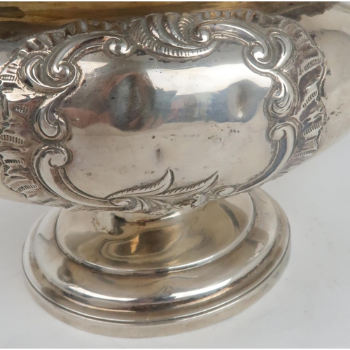 2473 - A GEORGE IV SCOTTISH SILVER TEAPOTby J Hay, Edinburgh 1820, of squat circular form, with an engraved... 