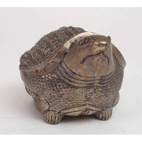 2482 - A CAMBODIAN WHITE METAL ZOOMORPHIC BETEL BOXmodelled as a tortoise, finely embossed and engraved, 19... 