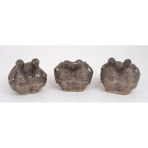 2483 - A TRIO OF CAMBODIAN WHITE METAL ZOOMORPHIC BETEL BOXESmodelled as pairs of quails, finely embossed a... 