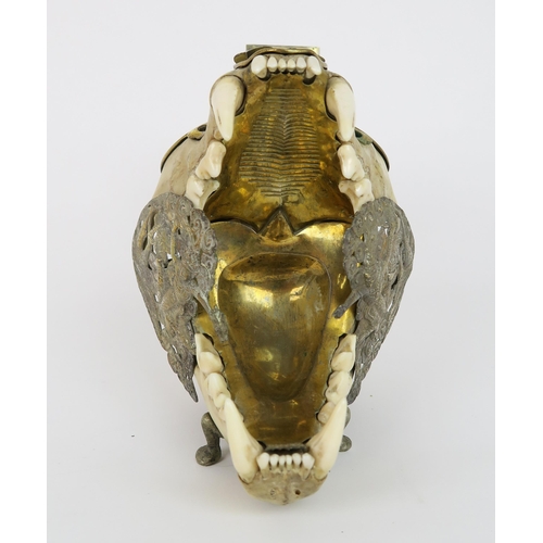 2556 - AN EARLY 20TH CENTURY LEOPARD SKULL SMOKER'S COMPENDIUMHoused in its original fitted 