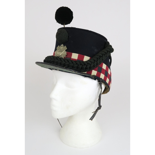 2652 - A LATE-VICTORIAN HIGHLAND LIGHT INFANTRY SHAKOThe body of deep blue wool cloth, with chequered red, ... 