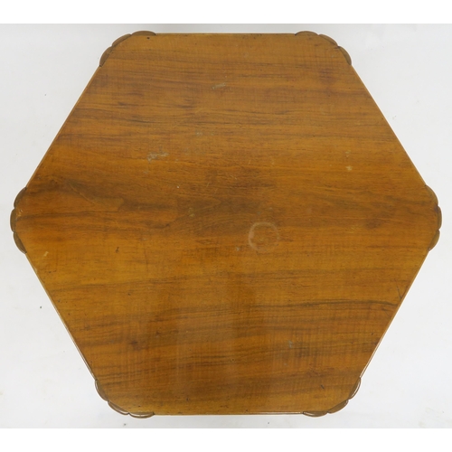 2004 - AN EARLY 20TH CENTURY HEAL & SON LONDON HEXAGONAL BOOK TABLEwith mahogany hexagonal top on shape... 