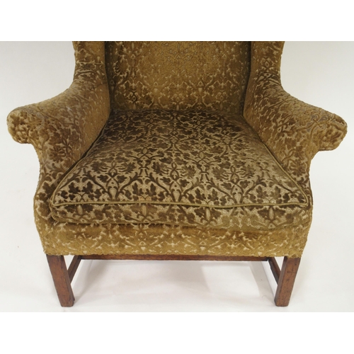 2013 - AN 18TH CENTURY STYLE WINGBACK ARMCHAIRwith mustard foliate damask upholstered seat on stretchered c... 