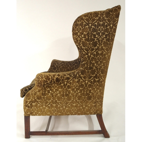 2013 - AN 18TH CENTURY STYLE WINGBACK ARMCHAIRwith mustard foliate damask upholstered seat on stretchered c... 