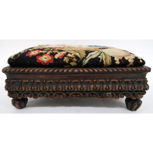 2029 - A 19TH CENTURY ANGLO-INDIAN TAPESTRY FOOTSTOOLextensively carved base with gadrooned edge on turned ... 
