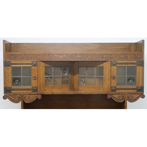 2041 - AN OAK ARTS & CRAFTS SIDEBOARD BY WARINGS FOR WARING G GILLOW LTD with leaded glass superstructu... 