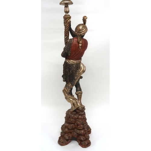 2046 - A 20TH CENTURY CARVED WOOD BLACKAMOOR STANDARD LAMPwith gilt five branch foliate light mount held by... 