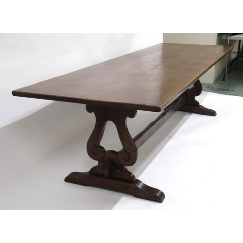 2047 - A LARGE 19TH CENTURY OAK REFECTORY TABLEwith rectangular top on lyre form supports joined by stretch... 