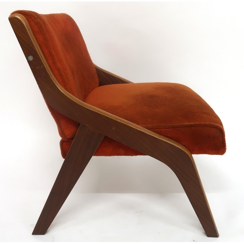 2114 - A MID 20TH CENTURY NEIL MORRIS FOR MORRIS OF GLASGOW LOUNGE CHAIRwith a laminated Formosa Teak frame... 
