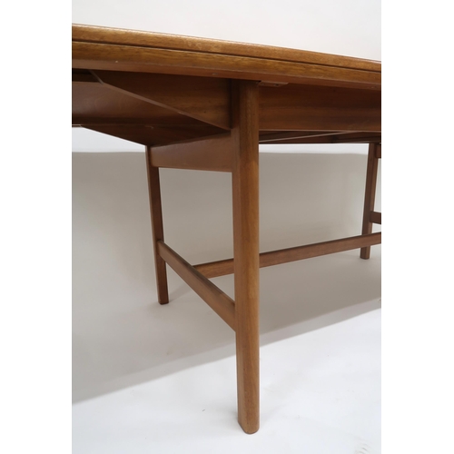 2118 - A MID 20TH CENTURY ROBERT HERITAGE FOR ARCHIE SHINE TEAK DINING SUITEcomprising six teak framed dini... 