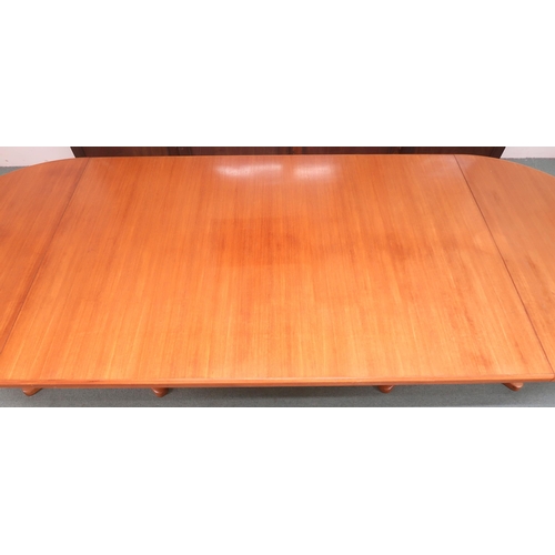 2118A - A MID 20TH CENTURY TEAK DINING SUITEcomprising large D end twin pedestal dining table, 73cm high x 3... 
