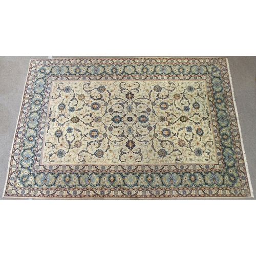 2140 - A CREAM GROUND KASHAN RUGwith all-over floral design and flower head border, 361cm long x 242cm wide... 