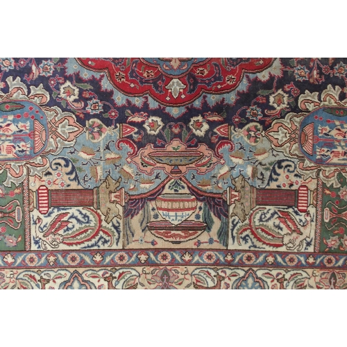 2142 - A MULTICOLOURED GROUND KASHMAR RUGwith red and blue central medallion upon an extensively decorated ... 