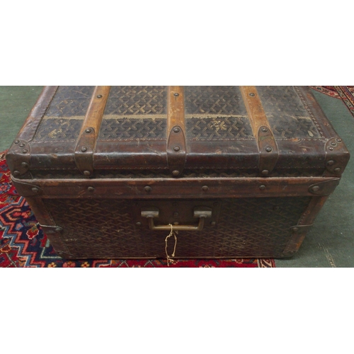 2007 - AN E GOYARD PARIS LEATHER AND WOOD BOUND STEAMER TRUNKwith all-over printed design, leather edges an... 