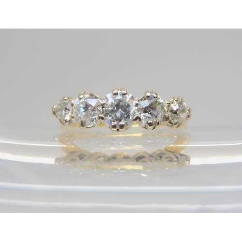 2701 - AN 18CT GOLD FIVE STONE DIAMOND RINGset with estimated approx 1.50cts of brilliant cuts. Finger size... 