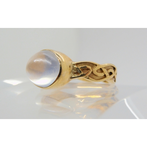 2705 - AN UNUSUAL SHETLAND GOLD MOONSTONE RINGwith 9ct gold Celtic knotwork band, fully hallmarked for Shet... 
