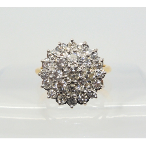 2710 - A SUBSTANTIAL DIAMOND CLUSTER RINGset with estimated approx 1ct of brilliant cut diamonds, finger si... 