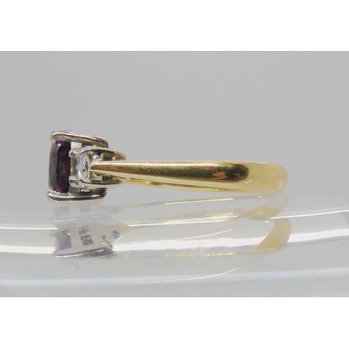 2713 - *WITHDRAWN*AN 18CT GOLD DIAMOND AND RUBELLITE RINGset with estimated approx two 0.25ct brilliant cut... 