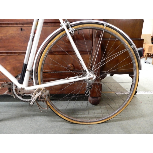 45 - A mid 20th century Cinelli Milano racing bicycle with weinmann brakes and Unica saddle, 24 inch fram... 