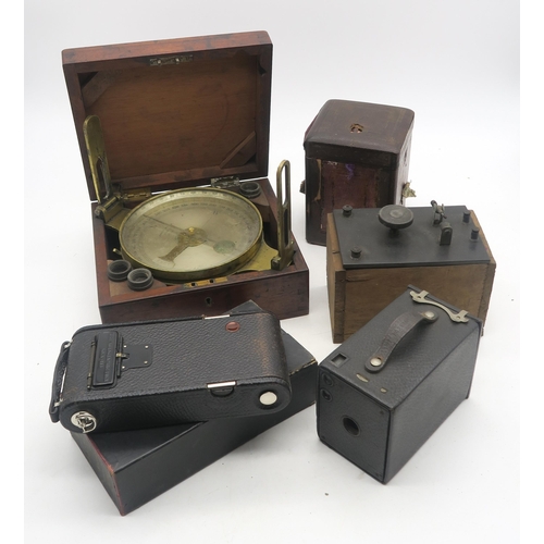 640 - A cased brass compass by James White, 78 Union Street, Glasgow, together with a boxed Kodak No. 1A A... 