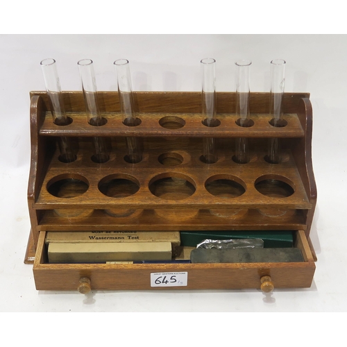 645 - Medical (ophthalmology) equipment, including a cased Stereosette Stereometer, Pyrex test tube rack e... 