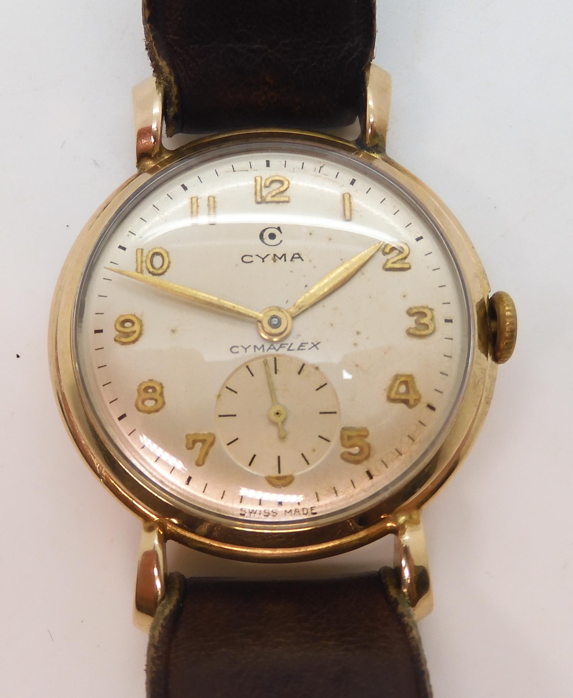 A 9ct gold Gents Cyma Cymaflex watch with brown leather strap