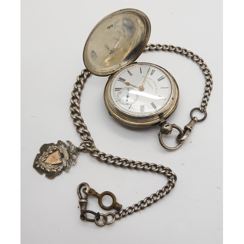 910 - A silver cased full hunter pocket watch, the dial marked Stewart Dawson & Co Liverpool, with sil... 