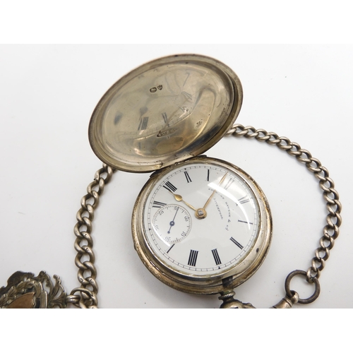 910 - A silver cased full hunter pocket watch, the dial marked Stewart Dawson & Co Liverpool, with sil... 