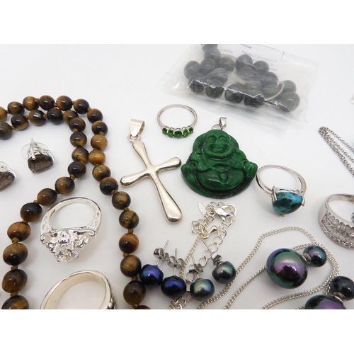 911 - A collection of silver and costume jewellery, to include items set with Welo opal, Russian diopside,... 