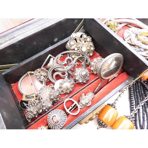 915 - A string of coral beads weight 20.4gms, a white metal Art Nouveau buckle, and other items of silver ... 