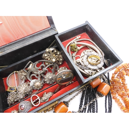 915 - A string of coral beads weight 20.4gms, a white metal Art Nouveau buckle, and other items of silver ... 