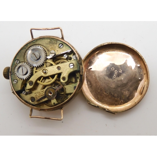 920 - Three 9ct gold cased ladies vintage watch heads, one with a gold plated strap, weight all together w... 