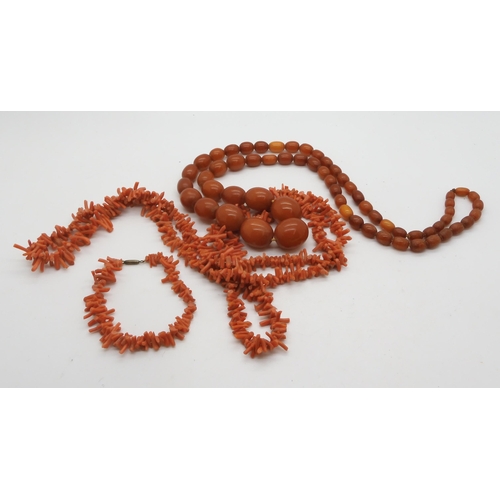 925 - A string of amber coloured beads, largest bead 2.4cm x 1.8cm, weight 63.9gms, together  with a ... 