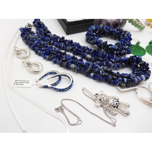 929 - A honey jade necklace and earrings, a Russian diopside silver snake ring, a lapis lazuli, necklace a... 