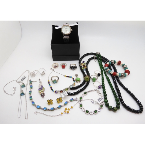 931 - An onyx and mother of pearl Strada watch, a Russian diopside large bead necklace, a Peacock quartz r... 