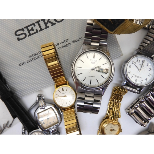 934 - A Seiko automatic, a ladies gold plated Longines, a gents Zeitner, a ladies Mirexal watch and other ... 