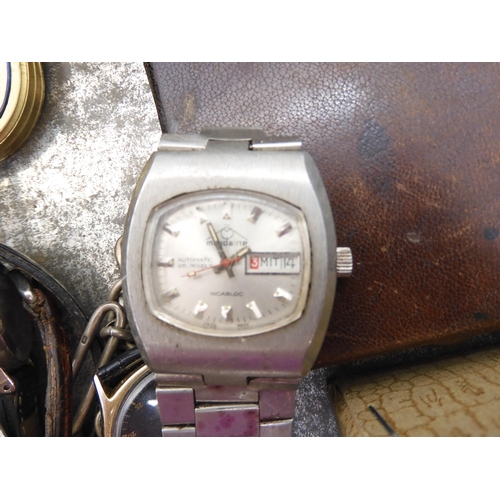 939 - A collection of watches and watch parts to include a Globa Sport watch, Triumph decorative pocket wa... 