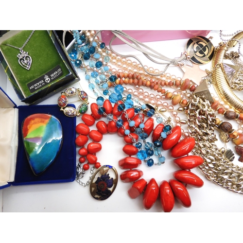 944 - Statement necklaces, an enamel butterfly brooch, rainbow ceramic brooch and other items