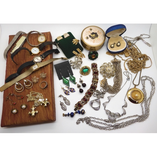 946 - A collection of vintage costume jewellery and watches, to include a Miracle scarf ring, Marcasite it... 