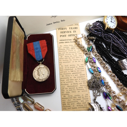 947 - A collection of vintage silver and costume jewellery to include a Imperial Service Medal, A silver b... 