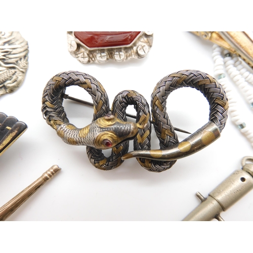 950 - A costume jewellery snake brooch of woven metal construction, a pair of Shakudo fan shaped shirt stu... 