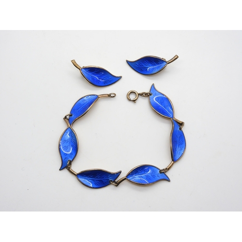 951 - A David Andersen, blue enamelled leaf bracelet and  clip back earrings