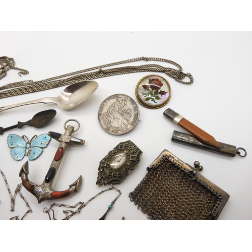 959 - A silver Peruvian coin brooch, dated 1885, a Victorian Glasgow silver spoon, A  white metal dress cl... 