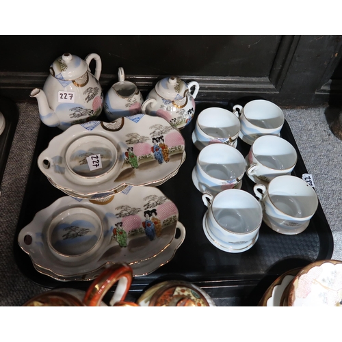 227 - Two Japanese eggshell teasets