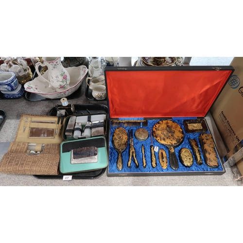 237 - A Chinese horn and tortoishell dressing table set, boxed together with two other brush sets and a mi... 